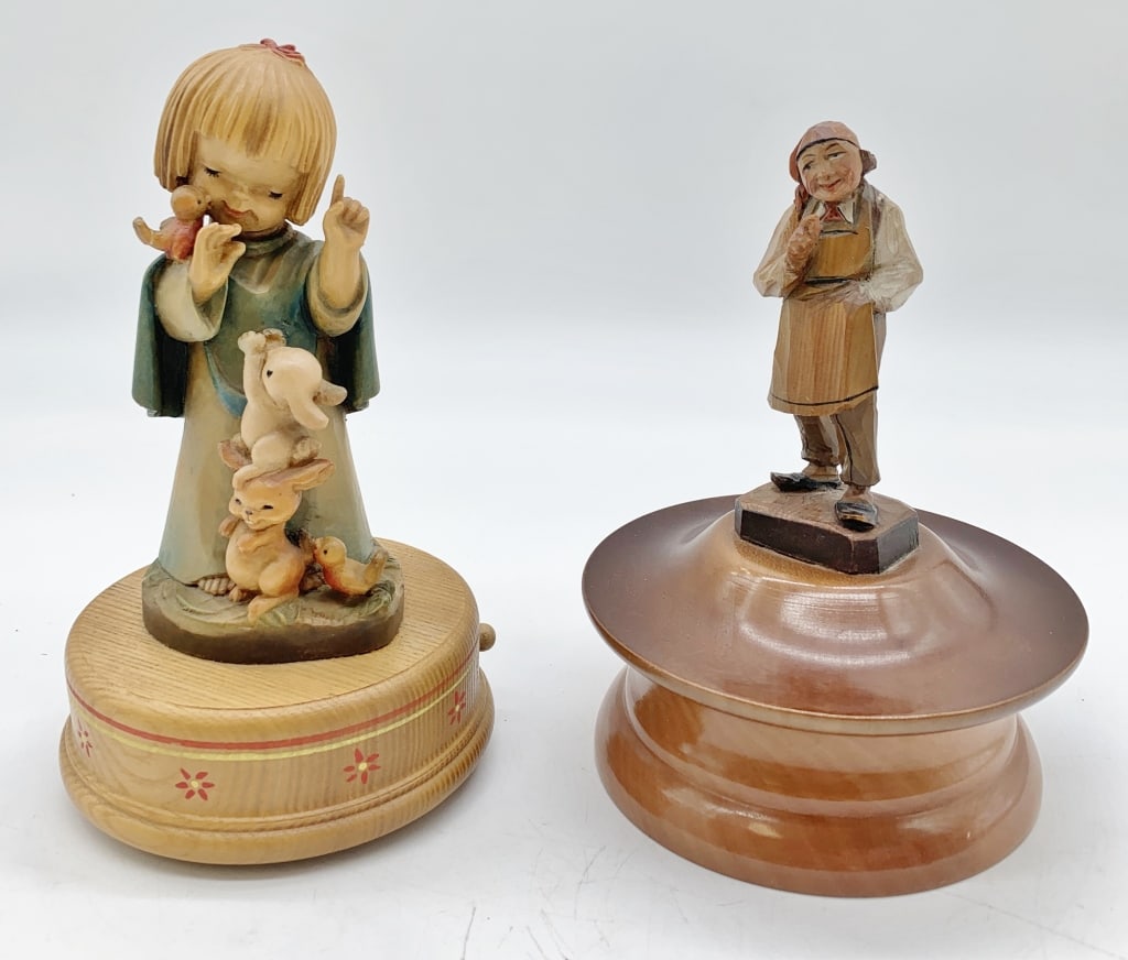 lot of 2 Wooden Carved Figures Music Boxes: neither music box plays, girl marked Anri, music box mechanism marked Reuge