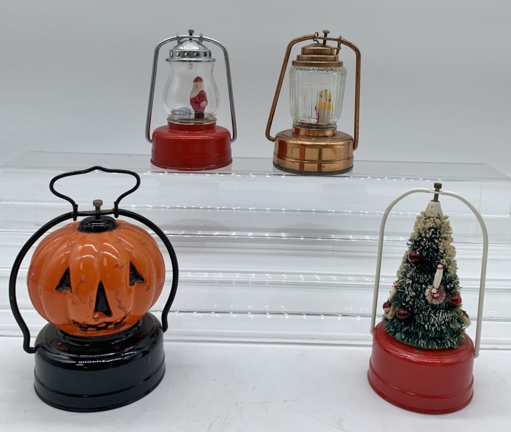 lot of 4 Battery Holiday Light Up Minature Lantern: untested, glass globes, pumpkin has chipped paint, marked Amico, Rose, one marked with a crown, Christmas tree unmarked, some wear on all