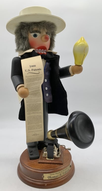 Christain Ulbricht T. Edison Nutcracker/Musicbox: musicbox works when you continuosly crank it, signed on the bottom of the base by probably the artist, comes with original box