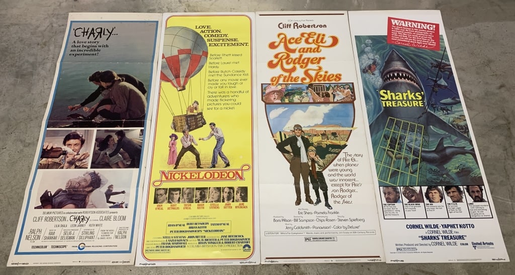 4 Vintage Movie Posters Charly, Nickelodeon: 14" X 36", have folds and creases, numbering on the bottom right hand corner, Shark's Treasure, Ace Eli and Rodger of the Skies
