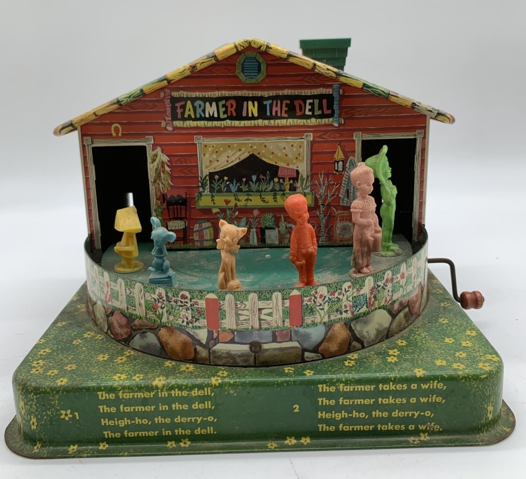 Mattel Farmer in The Dell Tin Wind Up Toy: wind-up mechanism does not work, dent on top middle front of farm, litho in good shape for its age, some dust and dirt