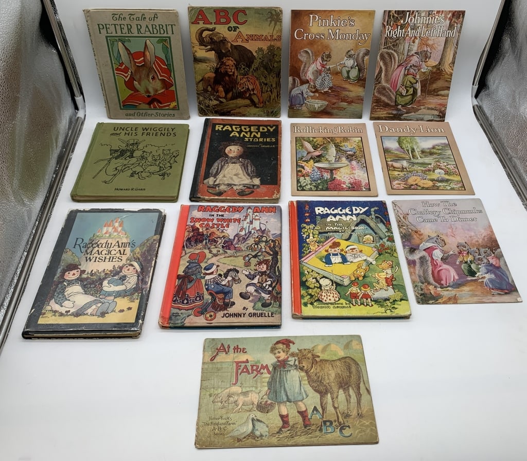 9 Children's Books,ABC of Animals.Peter Rabbit: 4 Raggedy Ann,1Uncle Wiggily,some corners bent,tears,ABC of Animals is linen,some writing on inside