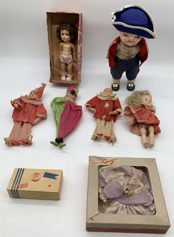 8 Dolls,3 with Crepe paper,Suitcase,Ginny/Box: arms loose,Ginger clothes,boxes broken