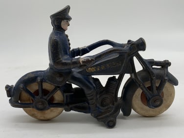 Champion cast iron policeman on motorcycle