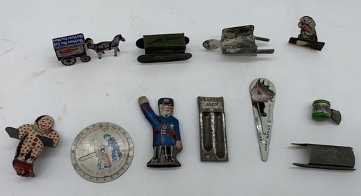 11 assorted Cracker Jack prizes