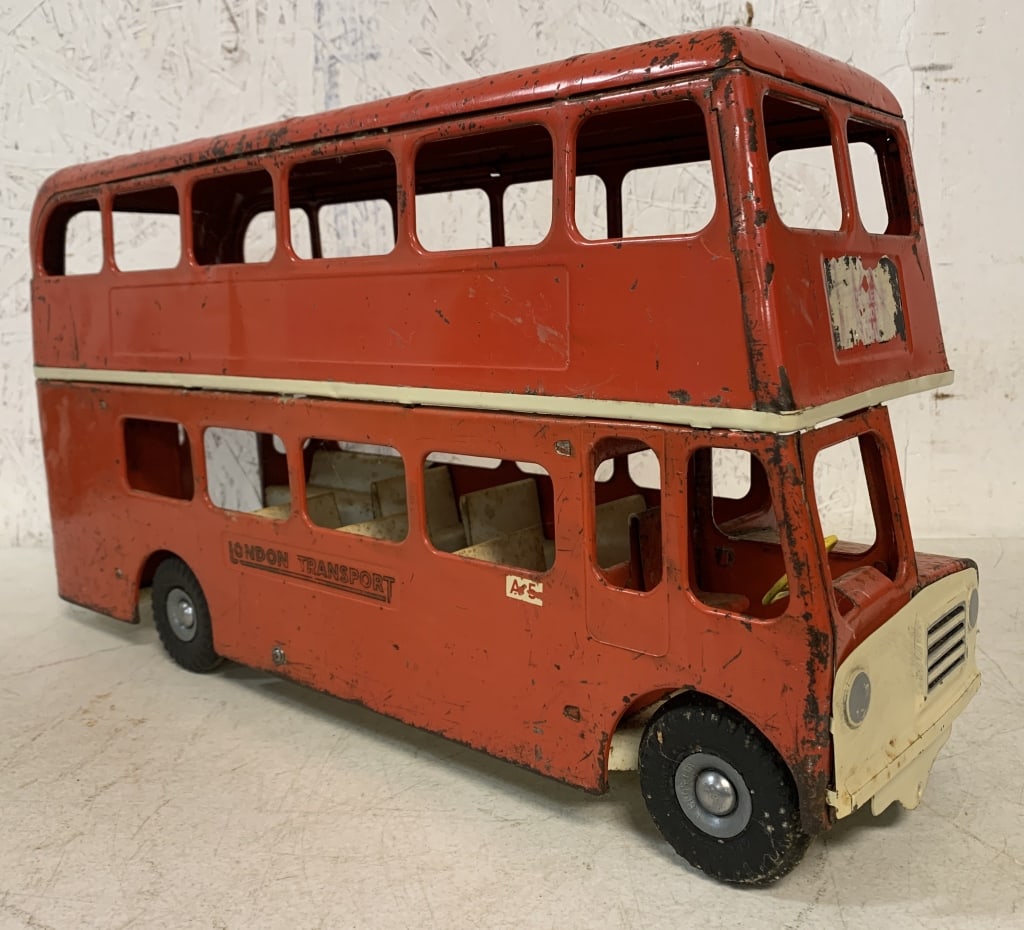 Tri-Ang Pressed Steel Double Decker Bus: lots of chipped and worn paint, decals badly worn, rust forming at a number of spots, some discoloration