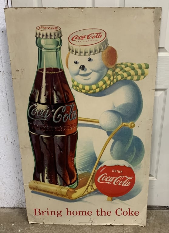 Bring Home the Coke Cardboard Sign: peeling around the edges, tears on left hand corner, some fading and wrinkles, 30" X 50", some areas with tape on the backside