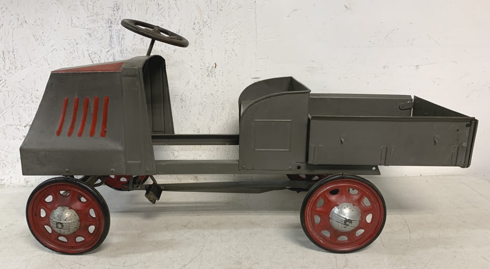 1930's Mack Pedal Truck: some type of metal/steel, repainted, wheels turn, wear on steering wheel and hubcaps, some paint wear, tires have cracks, no manufacturer name, 44" long,