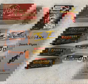 11 spark plug packages; all full except 2