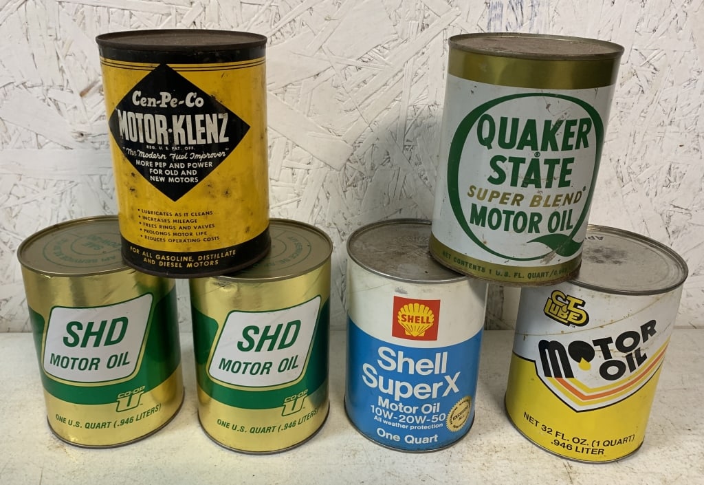 5 full oil cans & 1 full Motor-Klenz can: all quart cans show wear and some have dings; Motor-Klenz and Quaker State are metal, others are cardboard