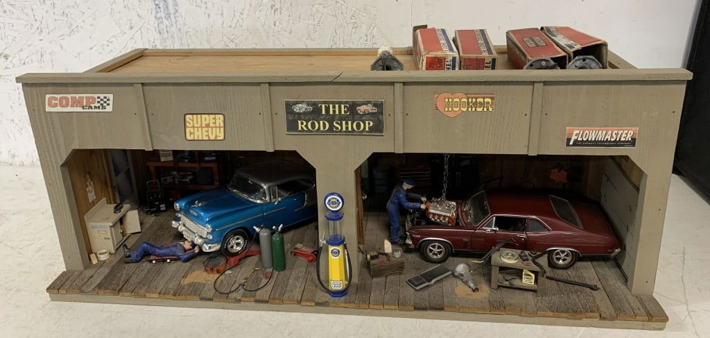 Rod Shop Diorama and 5 Lionel street lamps: 29 1/4" wide x 11 1/4" tall x 12 5/8" deep; has some wear; has a light in ceiling to illuminate shop