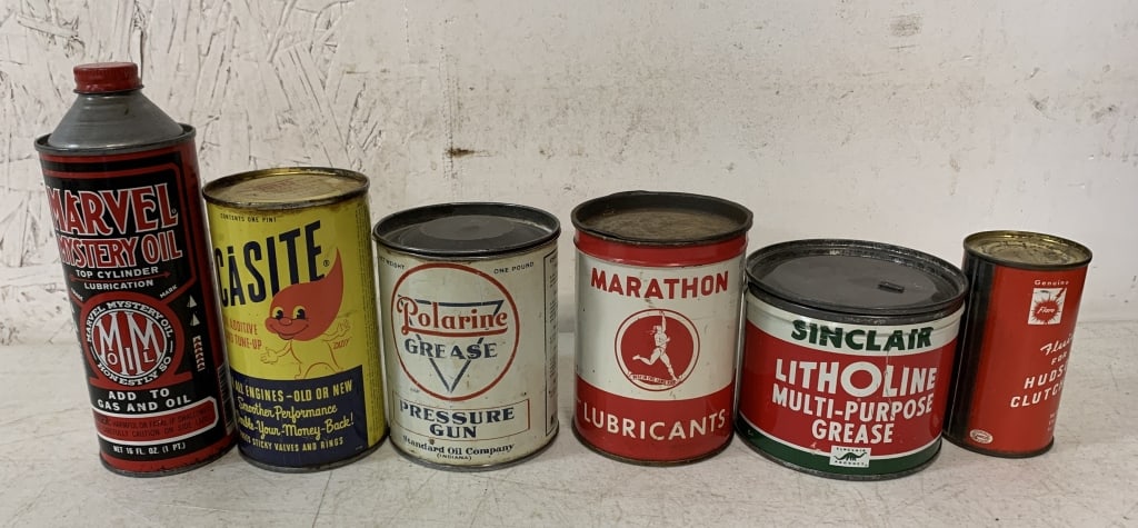 6 empty advertising tins, mostly automotive: see photos for brands and can conditions