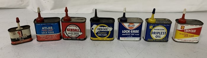 7 small oil and graphite cans