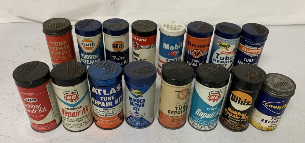 16 tube repair kits, most have content: cardboard and metal cans; see photos for brands and can conditions