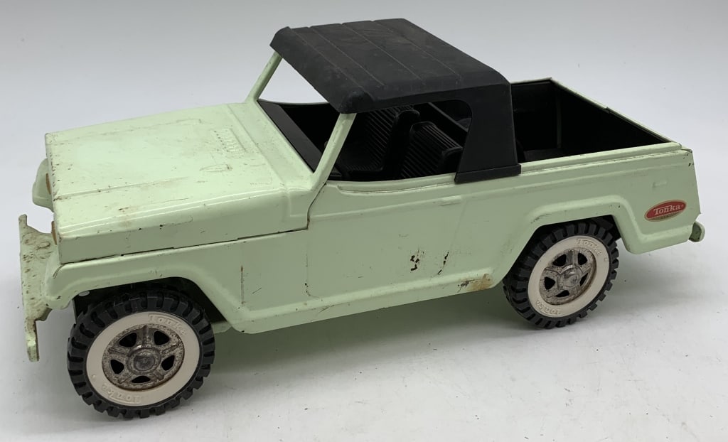 Tonka Jeepster Pickup: has scratches, rust and discoloration