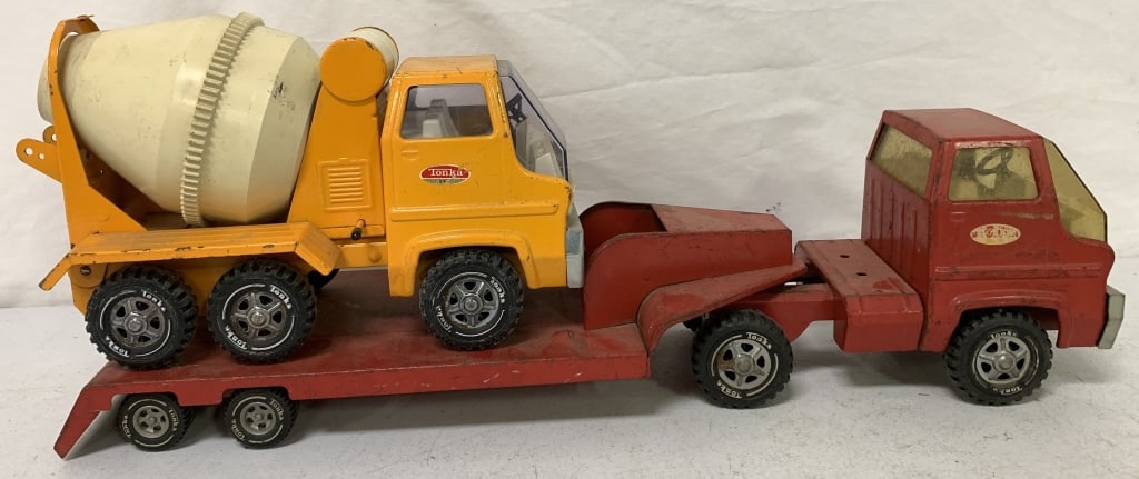 Tonka Low Boy and Cement Mixer: have scratches, paint loss and rust; discoloration and missing pieces, sticker loss