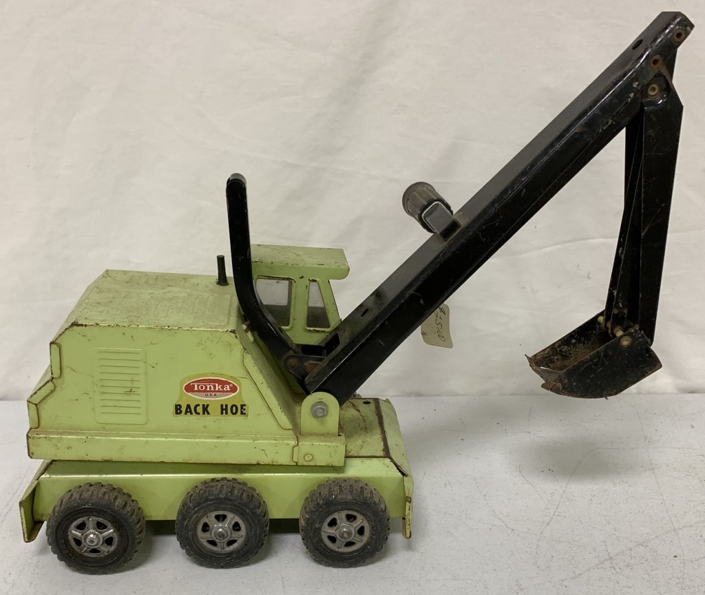 Tonka Back Hoe: has scratches, paint loss and rust; missing decals