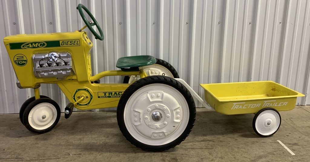 AMC 2 Ton Diesel Pedal Tractor w/ Cart: restored, pressed steel, chipped paint at the front corner, some brown staining on cart, some paint chips on tongue of cart, some chipped paint on seat and steering wheel, some of the spark plug wires