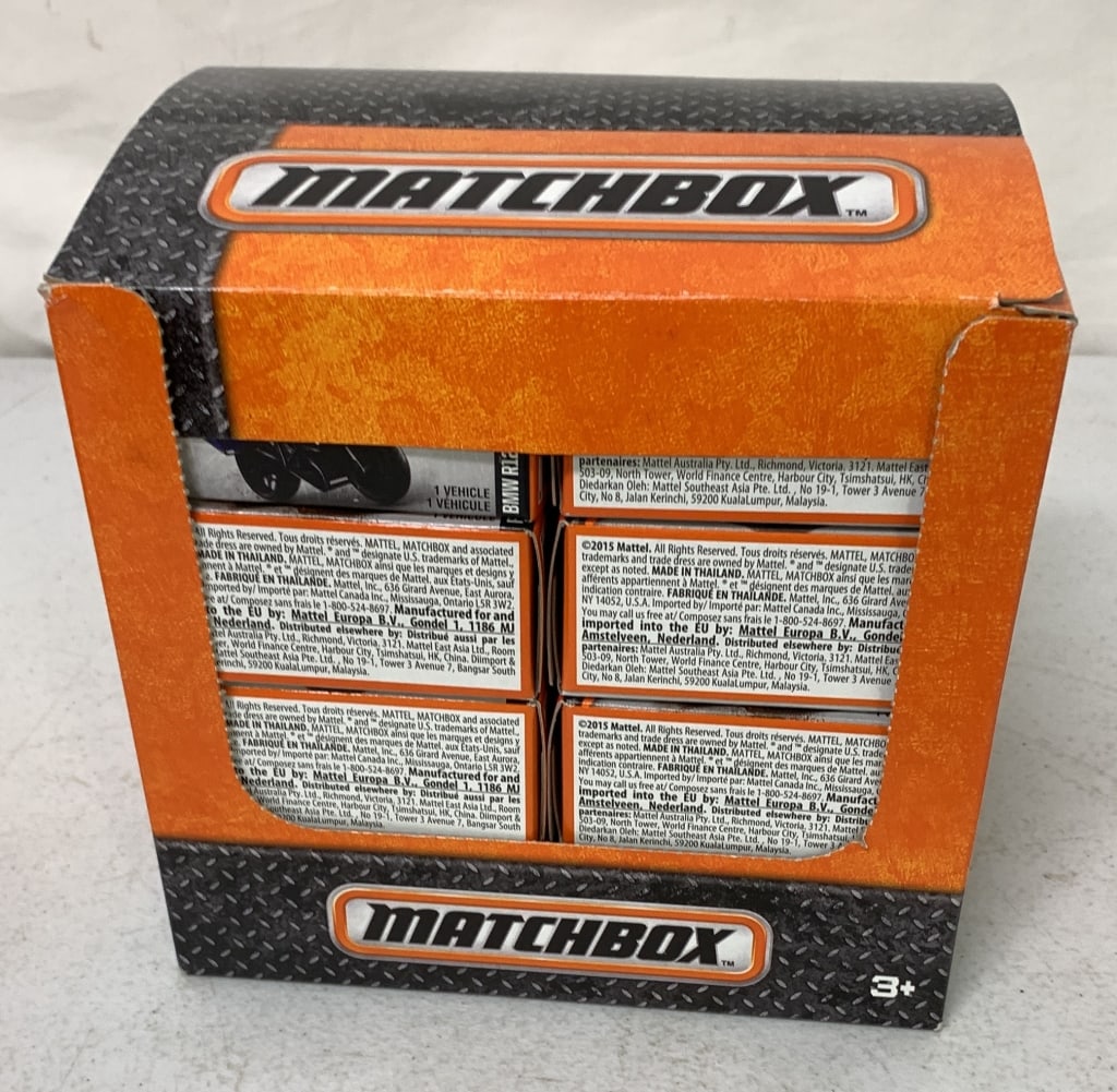 case of 24 Matchbox Single Cars w/ Store Box: various models