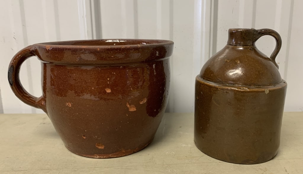 redware handled crock and small shoulder jug: redware has chips and hairline, jug has chip and is marked with an "F" at base