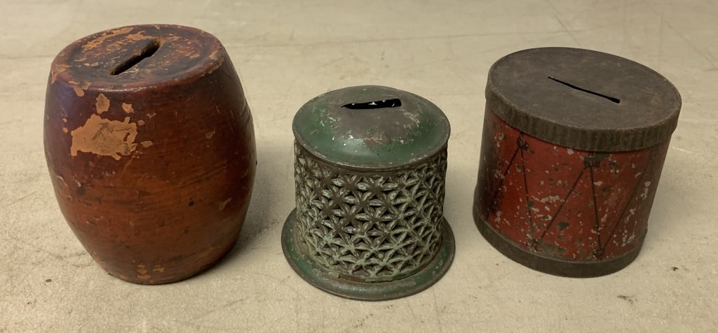 redware and tin banks: redware has some chips and paint loss; tin banks have dings and paint loss as shown