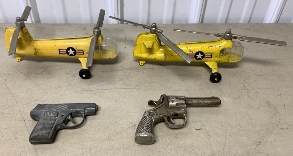 2 Hubley helicopters + 2 cap guns (1 of 7)