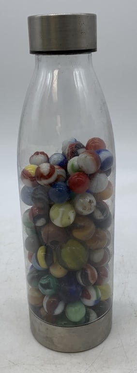 water bottle with marbles: marbles show wear