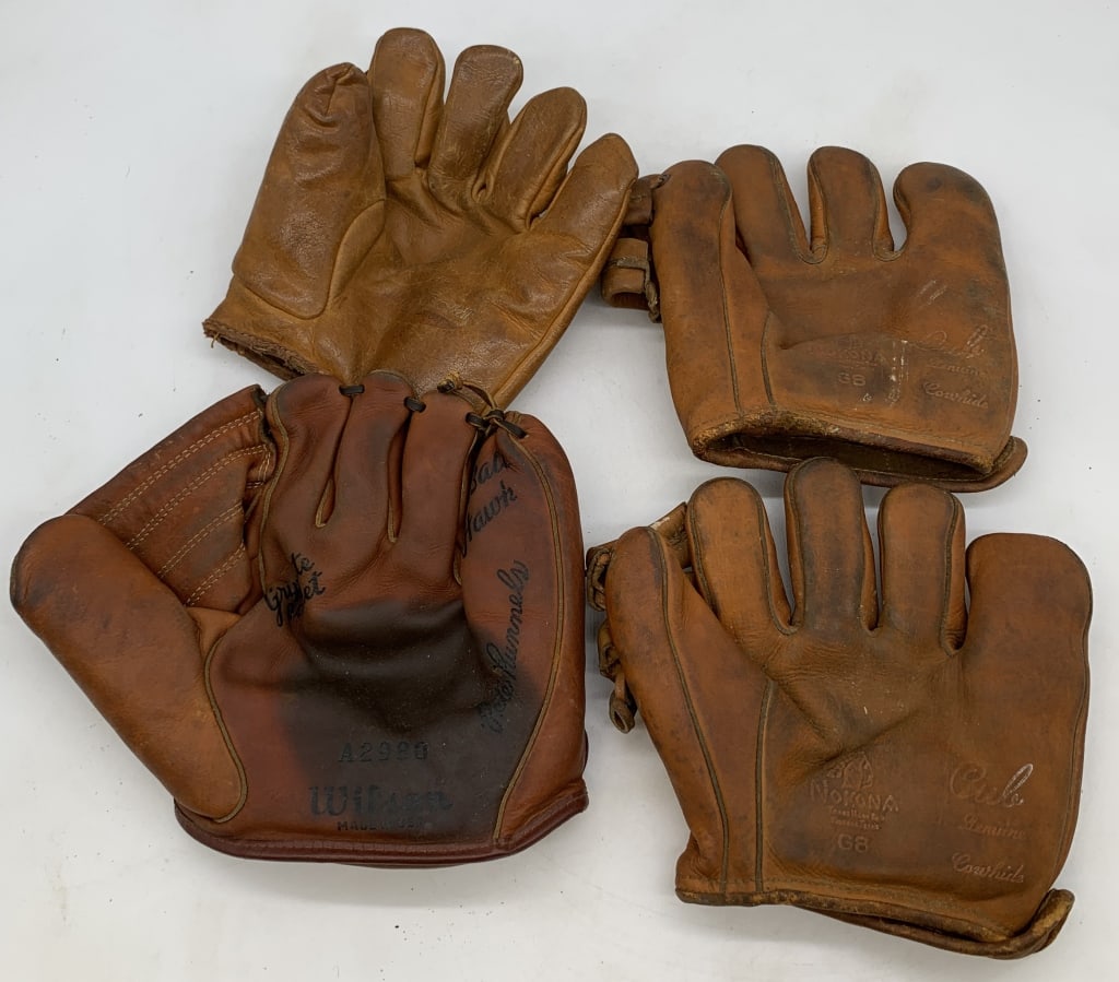 4 child size ball gloves (1 of 13)