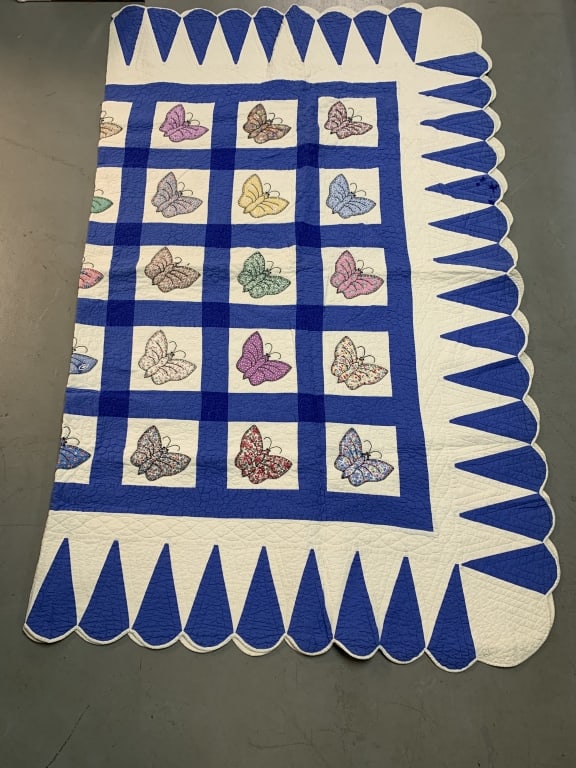 quilt with butterfly patterns: 92" x 88", some small stains
