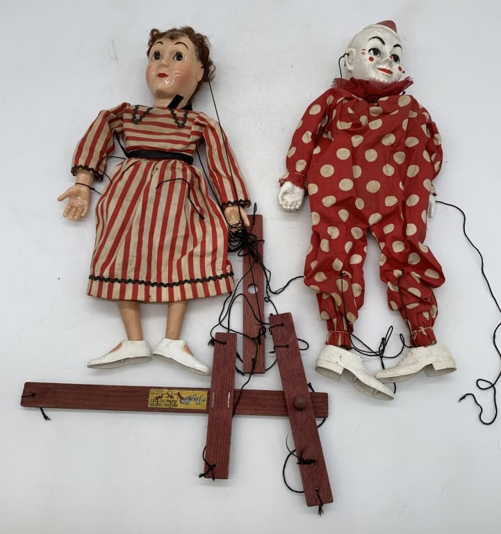 2 Hazelle's Airplane Controlled Puppets: lady and clown,lady has hair missing,very tangled,dirty