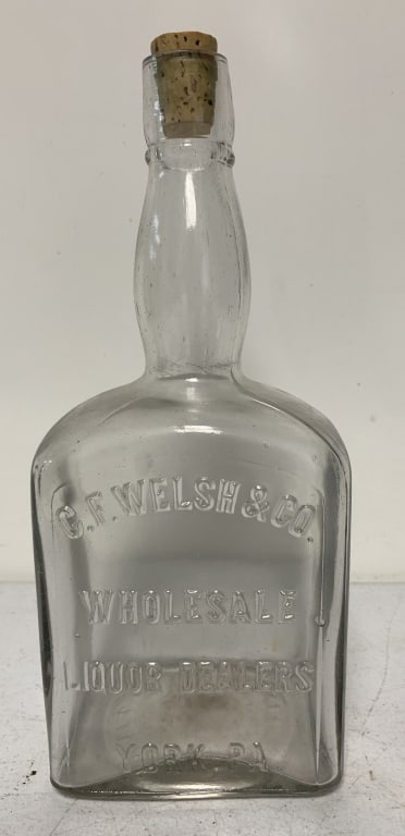 C.F. Welsh & Co. Liquor Dealers York, PA bottle: has wear with scratches