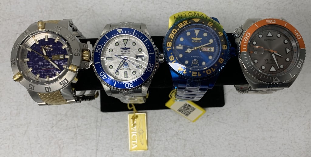 4 Invicta men's watches: do not appear to have wear; some have tags and protective wrap