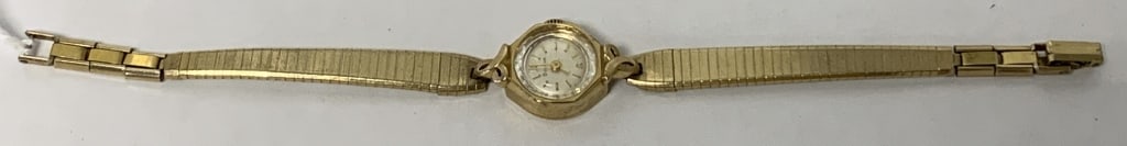 10k Gold Ladies Bulova Wristwatch: watch untested, both watch and bracelet marked 10k, Jewelry purchases that require shipping must be paid by Wire or Check, no Credit Card