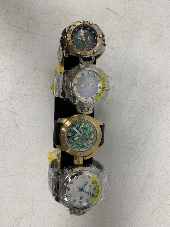 4 Invicta men's watches: do not appear worn; some still in protective plastic with tags; Watch purchases that require shipping must be paid by Wire or Check, no Credit Card