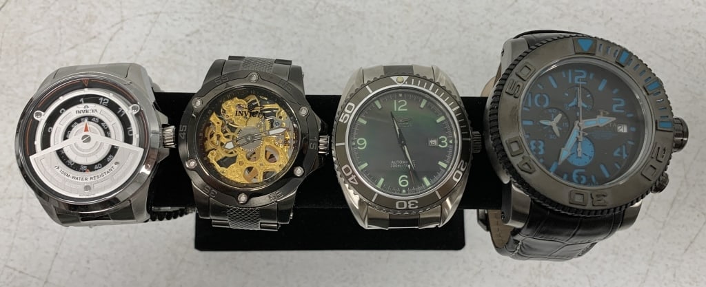 4 Invicta men's watches: some scratches to two of metal bands, light wear; Watch purchases that require shipping must be paid by Wire or Check, no Credit Card