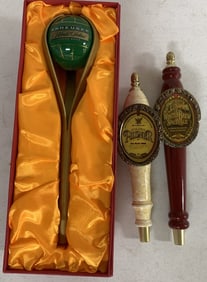 3 beer tap handles