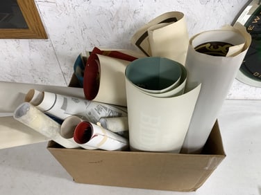 box of mostly beer posters
