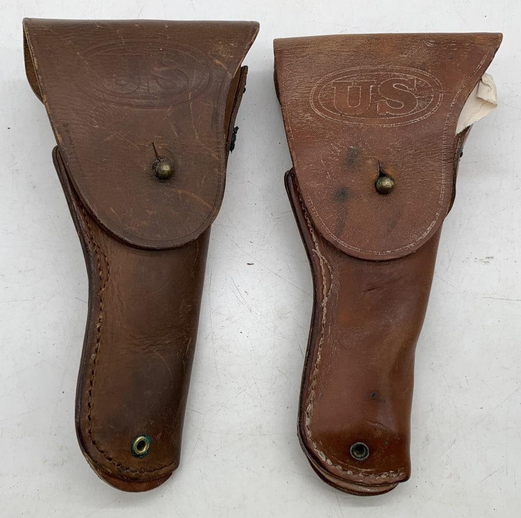 lot of 2 U.S. Leather Gun Holsters: both stamped U.S. Warren Leather Goods, age and wear