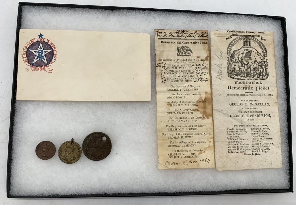 1864 McClellan Letter Cover, Ballot Pair & Medal T: Cover has candidate/General in "The Star Of Liberty" design w/mounting marks on verso., Ballots have moisture marks and handling. Tokens 3/4" to 1-3/16" VG to VF.
