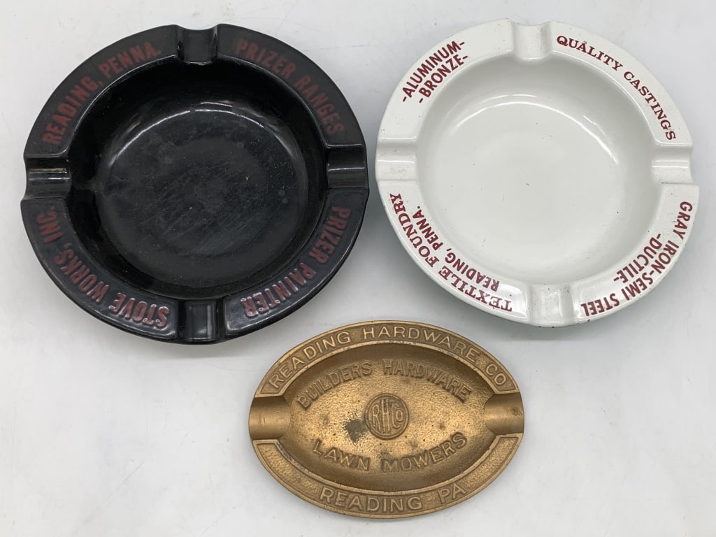 lot of 3 Reading PA Ashtray Advertising: Reading Hardware is a cast type material, Stove Works Inc and Textile Foundry are heavier ceramic, all in good conditions
