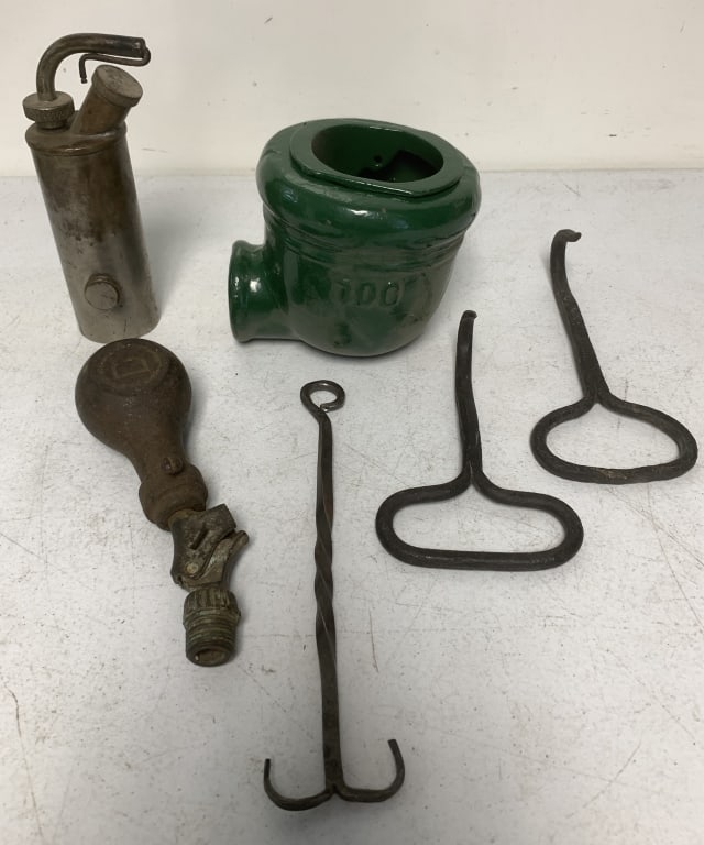 alcohol torch, well pump diverter, hooks, etc.: diverter appears unused the rest show wear