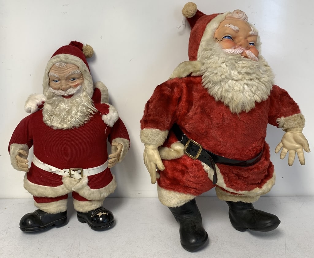 lot of 2 Vintage Santa Claus: both are plush with plastic hands, faces, white fur on coat trim has some discoloring and staining especially on the larger Santa, smaller Santa has torn belt, no names or markings