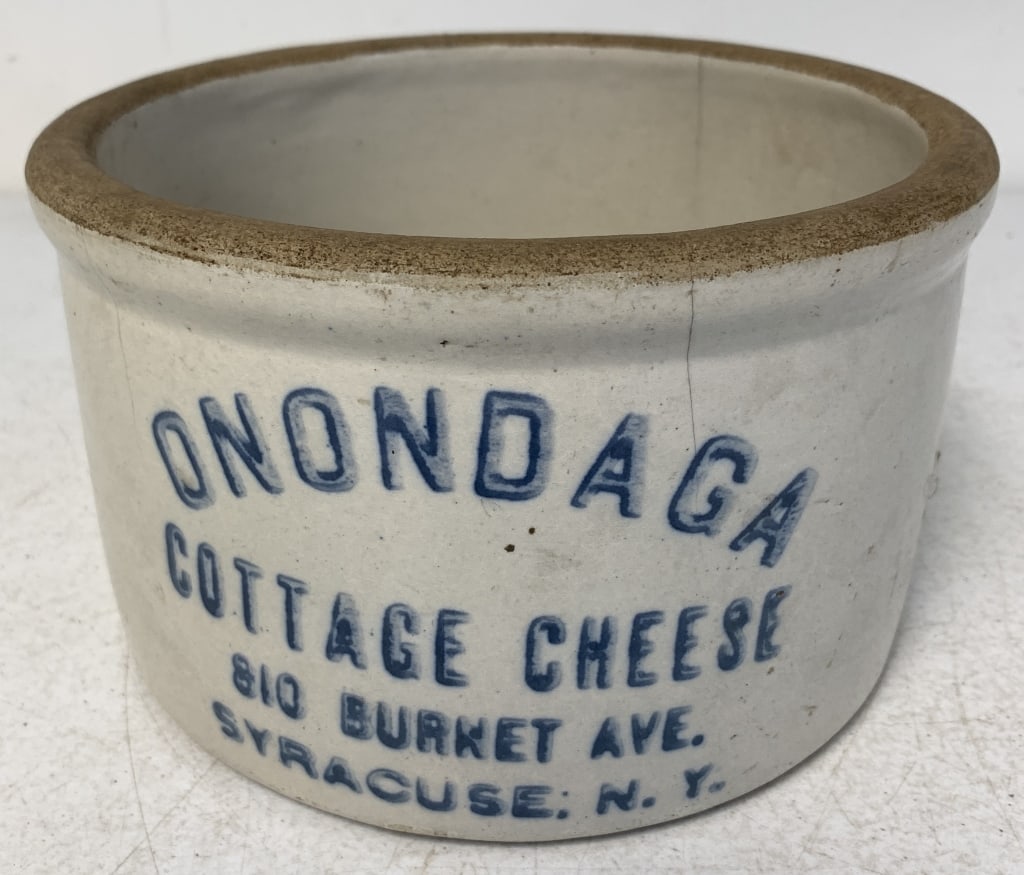 Onondaga Cottage Cheese Stoneware Container: hairline crack on front near the letter "G" in Onondaga, wear and age