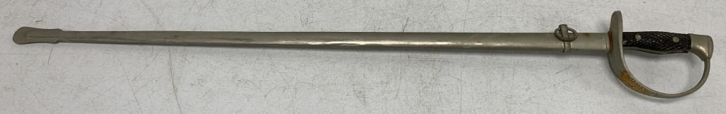 Sword & Scabbard: sword stamped Spain on one side by the handle and Toledo on the other, metal scabbard, color worn near hand guard