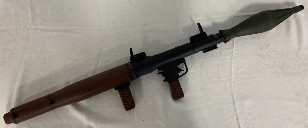 plastic RPG-7 launcher replica: missing piece; requires third party shipping
