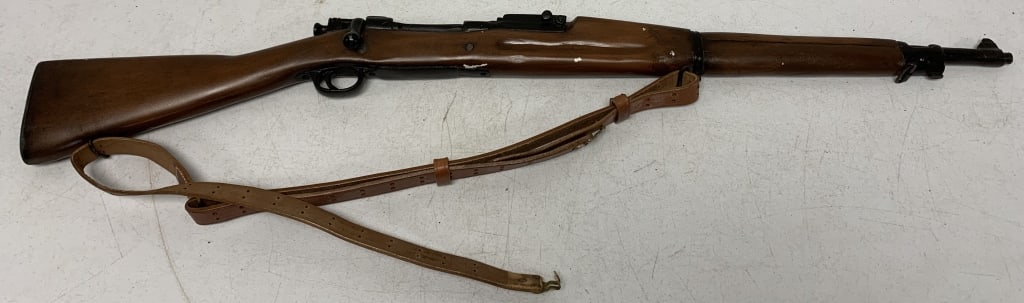replica rifle w/no moving parts, sling attached: has wear with scratches; requires third party shipping