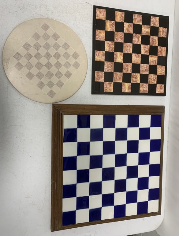 3 chessboards; tile and marble; round one made in: crack in marble one