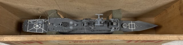 ship model in shipping crate, no lid: crate is 15 3/8" tall x 9 1/8" wide x 38 1/4 long; appears to have minor damage and missing parts