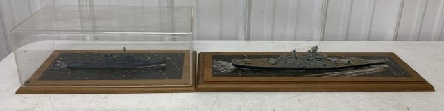 2 ship models on board: only one has cover; both have wear and some damage