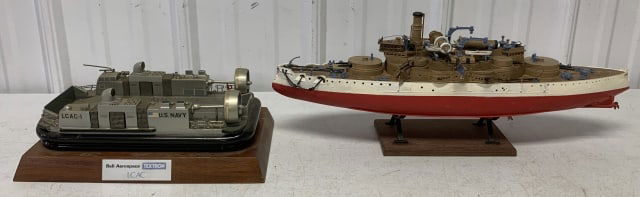 2 ship models: LCAC has scratches to base; plastic model has damage